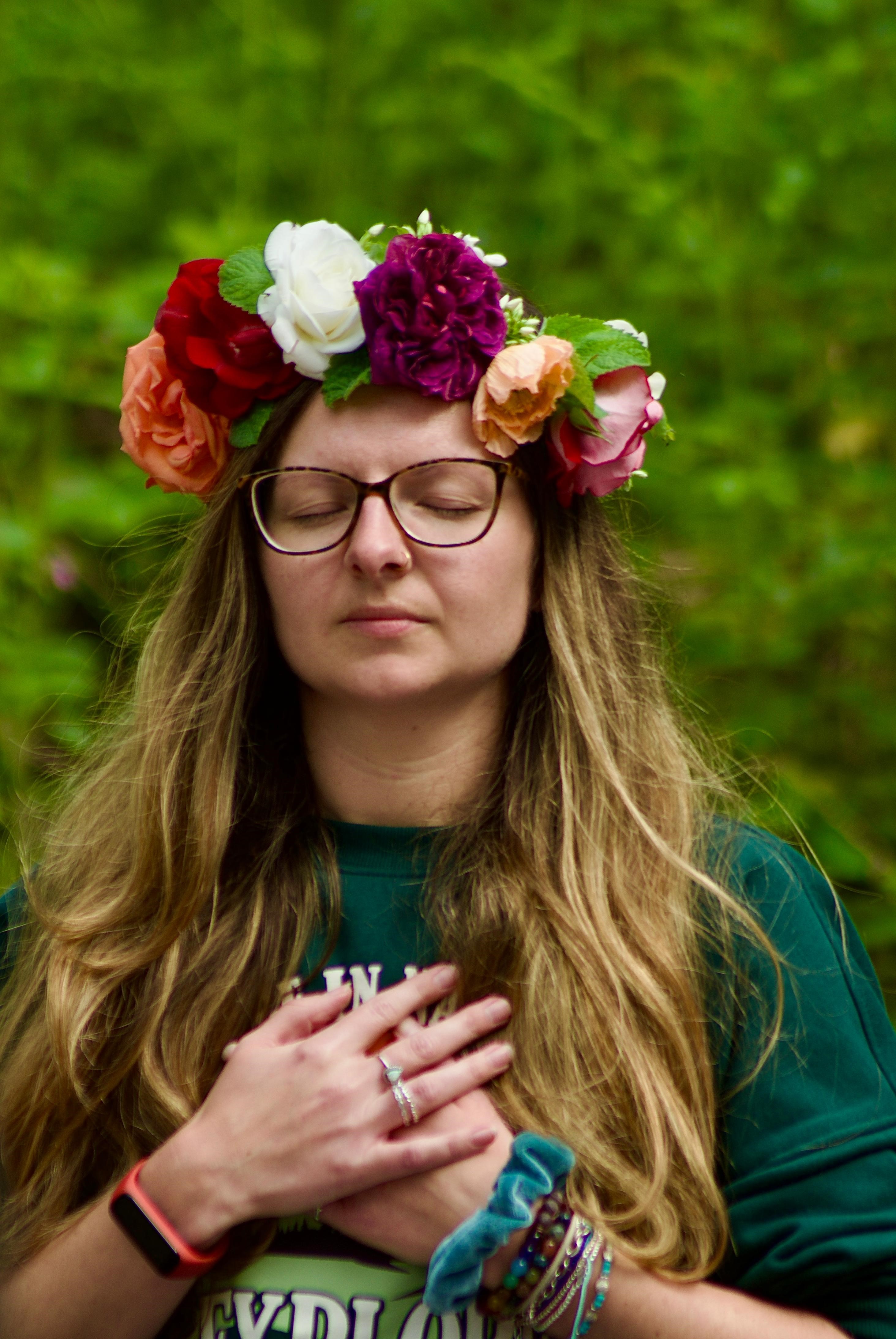 Image of Nic mediating with hands on heart
